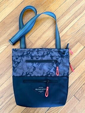 Sherpani Crossbody Bag with Red Zipper Pulls